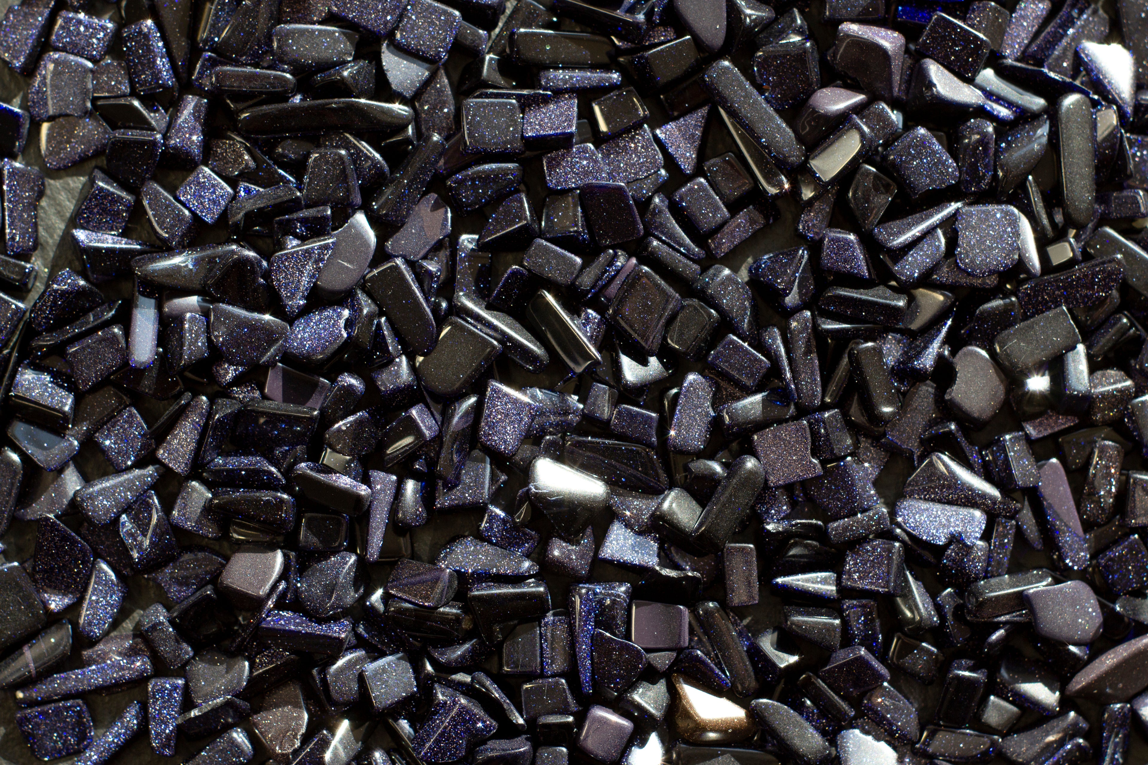 Adobe Stock photo of blue goldstone chips in a pile